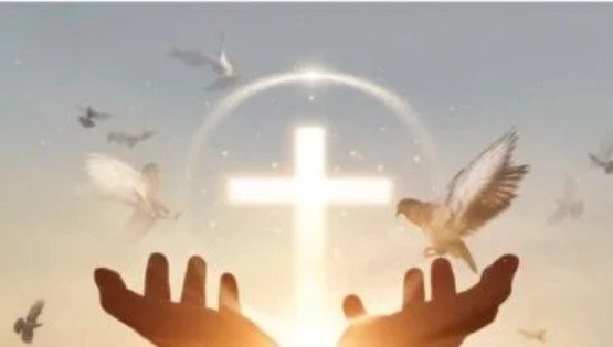 The Holy Spirit in Believers - Hands towards cross